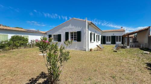 Superbe villa à deux pas des commerces avec jardin