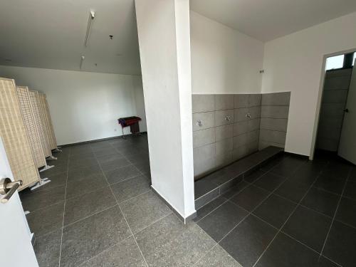 an empty room with a tiled floor and white walls at Seri Kembangan Metacity, Cikgu Kabinet Empire, Equine Park,MRT Station, IOI mall, Putrajaya, Cyberjaya, Farm in the city, Uptown Equine in Seri Kembangan