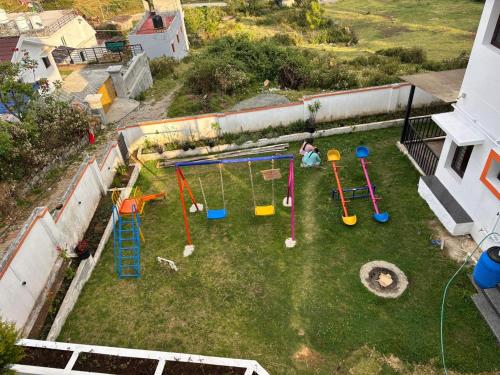an aerial view of a playground in a backyard at VGR-HOMESTAY in Kodaikānāl