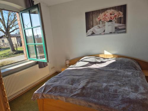 Katil atau katil-katil dalam bilik di Ferienwohnung in Neuhof-Penkun