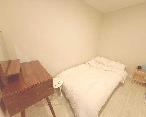 Letto o letti in una camera di GreeneStay Sindang DDP Seoul