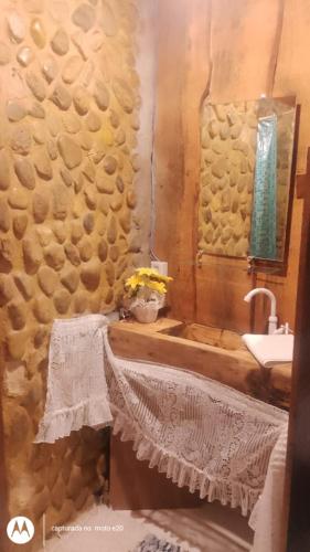 a bathroom with a sink and a sink at Casa bellavista in Resende