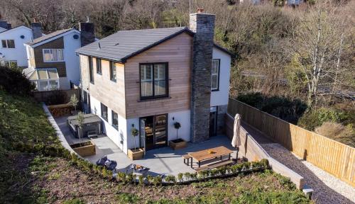 an aerial view of a house with a patio at Redwalls Luxury House in Dartmouth