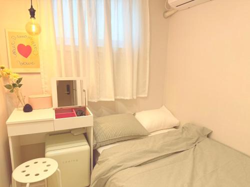 Letto o letti in una camera di GreeneStay Sindang DDP Seoul