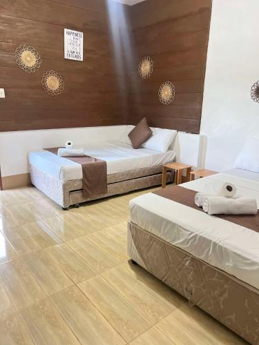 Postel nebo postele na pokoji v ubytování Sequor Palm Villa