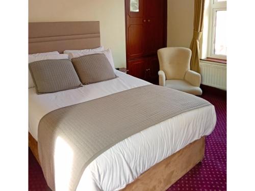 Una cama o camas en una habitación de O'Donoghue's