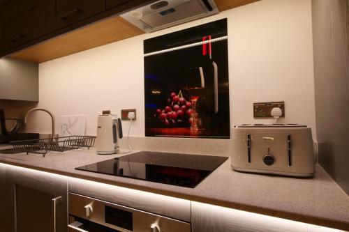 Η κουζίνα ή μικρή κουζίνα στο Swift Apartments York