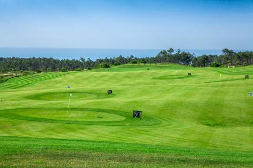 a view of a green golf course at Royal Obidos Scenic Resort in Casal da Lagoa Seca