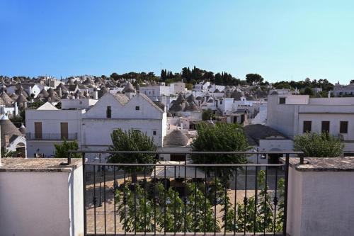 a view of a city with white buildings at 'Largo Dei Sapori House' in Alberobello