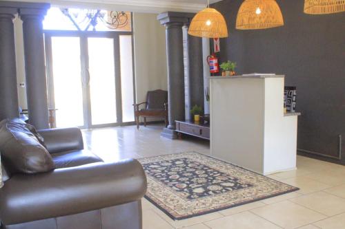 Χώρος καθιστικού στο Fairview Guest House Hartswater