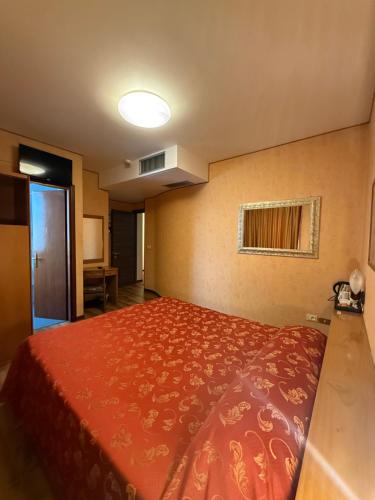 Postel nebo postele na pokoji v ubytování Hotel Al Sole