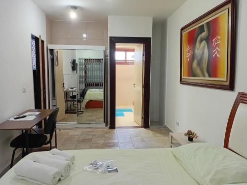 Katil atau katil-katil dalam bilik di Na Praia- Espaço Dom Artur