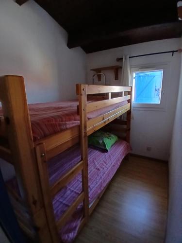 Postel nebo postele na pokoji v ubytování Maisonnette n 43" La Tortue "