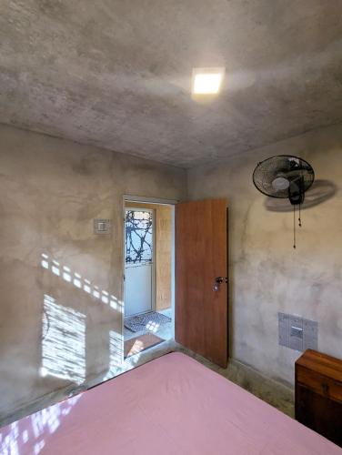 an empty room with a door and a window at Amandawa Eco in Gampaha