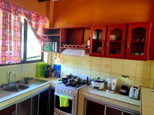 Η κουζίνα ή μικρή κουζίνα στο Apartahotel Playa Luna