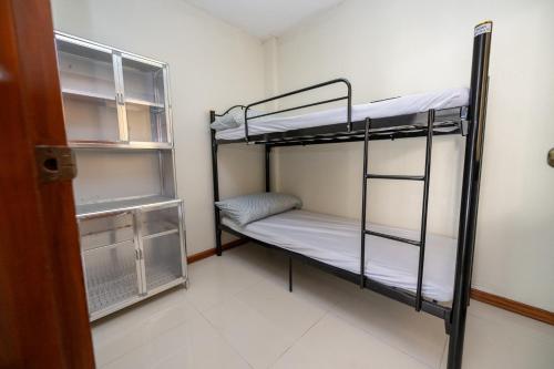4BR PUBJ RestHouseにあるベッド