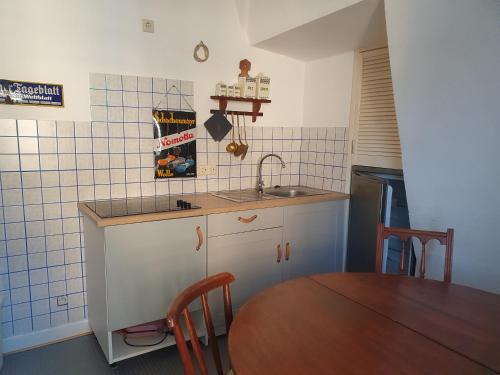 Apartment Lolloにあるキッチンまたは簡易キッチン