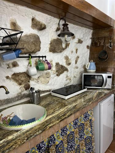 Η κουζίνα ή μικρή κουζίνα στο Rosalia House