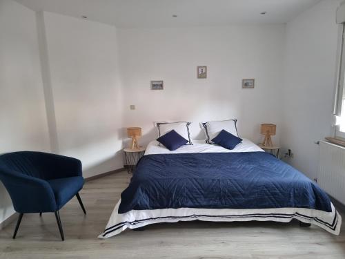 Katil atau katil-katil dalam bilik di Maison 3 chambres avec jardin à Equihen-Plage