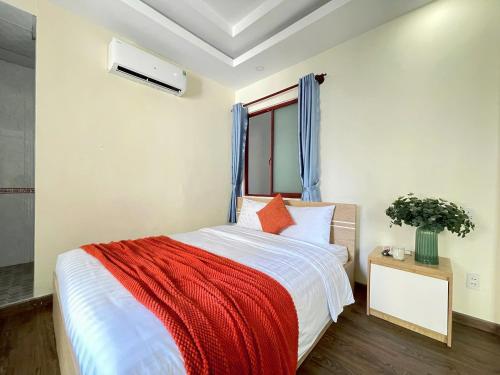 Postel nebo postele na pokoji v ubytování Joi Boutique Bãi Trước