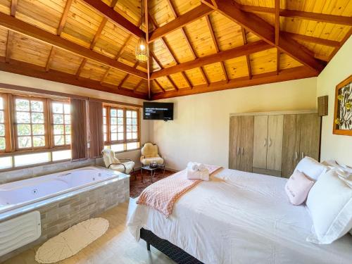 Ένα ή περισσότερα κρεβάτια σε δωμάτιο στο Apartamentos da Jo