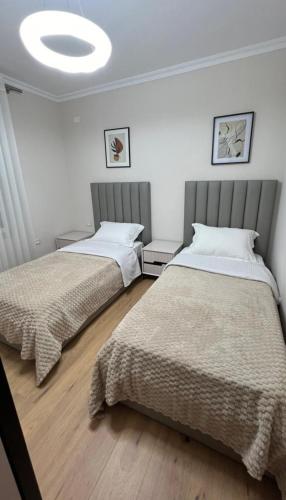 Una cama o camas en una habitación de Magnolia's Apartment