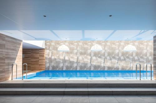 Bazén v ubytování Lovely View Studio Building Heated Pool Gym Turco WIFI nebo v jeho okolí