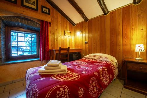 Una cama o camas en una habitación de Arthemisia