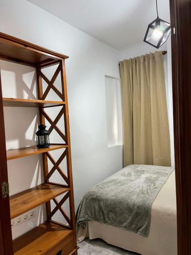 Una cama o camas en una habitación de El Piso