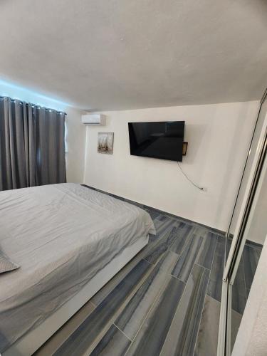 Llit o llits en una habitació de Rainforest Serenity Home