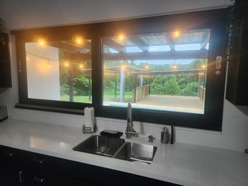 Cuina o zona de cuina de Rainforest Serenity Home