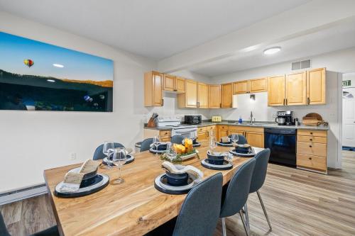 a kitchen with a table and chairs in a room at Hot Tub Hideout- Private & Downtown Access in Custer