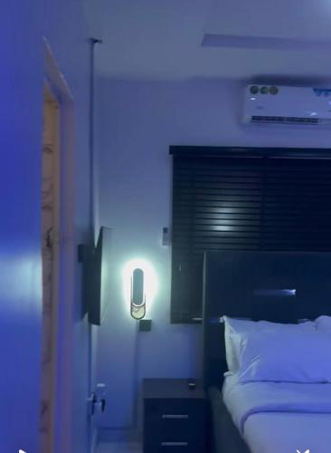 Postel nebo postele na pokoji v ubytování Serenity Oasis