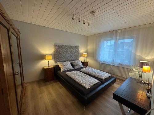 Postel nebo postele na pokoji v ubytování Ferienwohnung komham