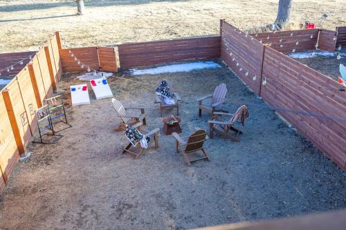 an overhead view of chairs and tables and a fence at Fireside Grove- Downtown Stay with Hot Tub in Custer