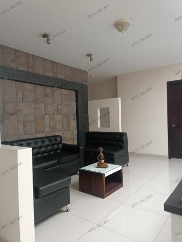 Posezení v ubytování Hotel Quezada Hermanos