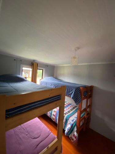 Postel nebo postele na pokoji v ubytování Nuevo amanecer