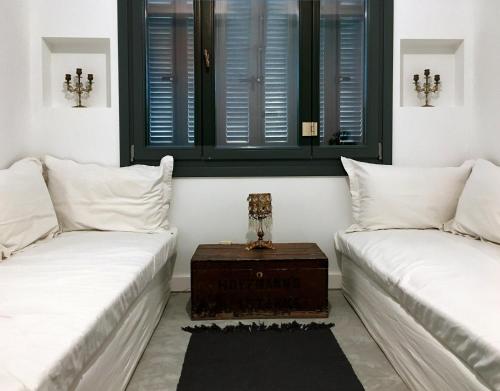 Posteľ alebo postele v izbe v ubytovaní Susanna Apartments - Your Oasis in Athens Ano Petralona