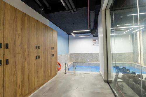 a swimming pool in a room with a swimming pool at Liora ليورا in Riyadh