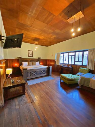 Hotel Mucháにあるベッド