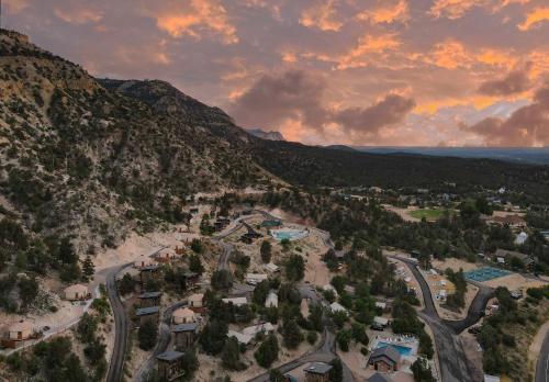 an aerial view of a resort in the mountains at Glamping Tent #10 with Heat AC and Private Bath in Orderville