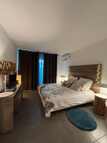 Postel nebo postele na pokoji v ubytování Studio Mahana