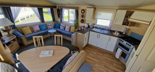 an aerial view of a living room and kitchen in a caravan at Bewles Caravan in Rhyl