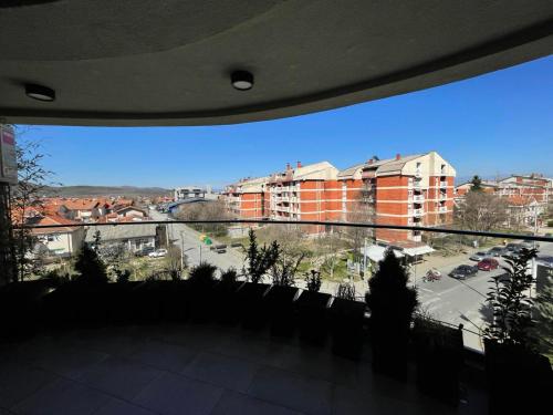 a view of a parking lot from a balcony at Urban Living in Gevgelija
