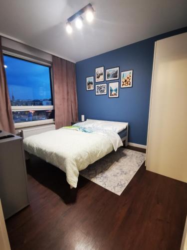 Ένα ή περισσότερα κρεβάτια σε δωμάτιο στο Apartament Siedlce 2