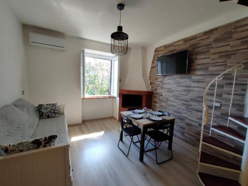 TV a/nebo společenská místnost v ubytování Casa Elide 2