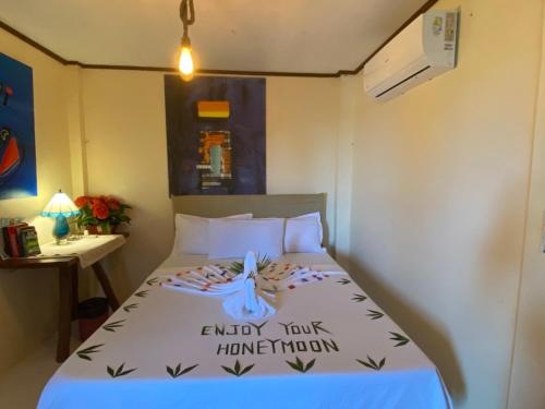 Letto o letti in una camera di Santa Claus Hilltop