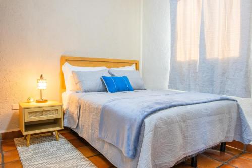 Una cama o camas en una habitación de Depas WAICURA'S