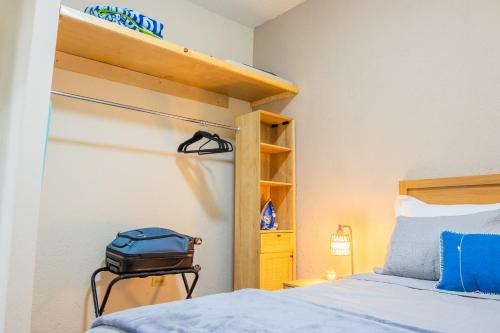 Una cama o camas en una habitación de Depas WAICURA'S