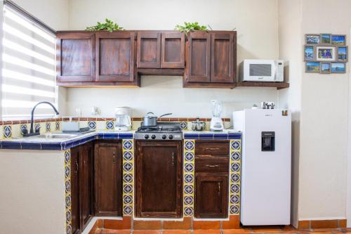 Una cocina o cocineta en Depas WAICURA'S